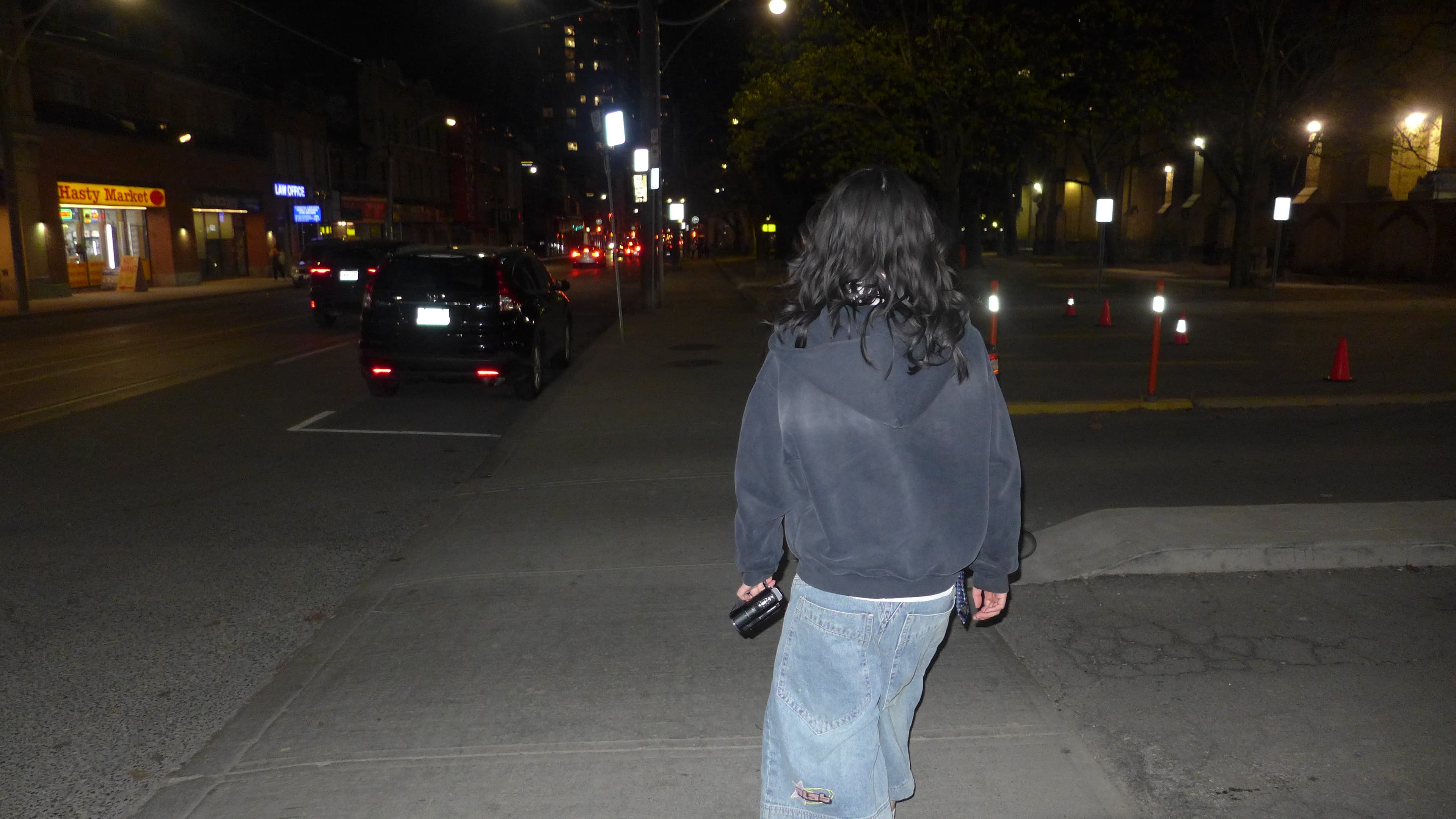 A nighttime street photo introducing the blog